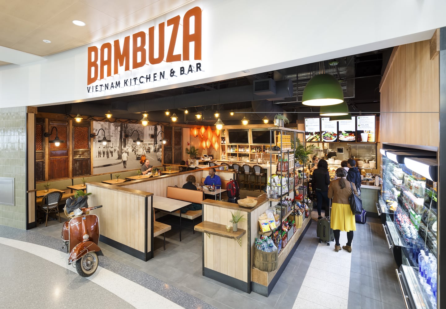 Full view of Bambuza Seatac Vietnam Kitchen and bar with guests dining and in line