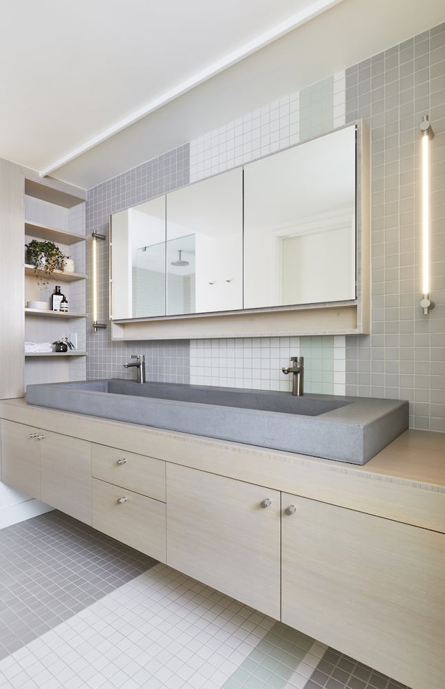 Vanity with concrete sink, mosaic tile stripes, bamboo cabinets, open shelving