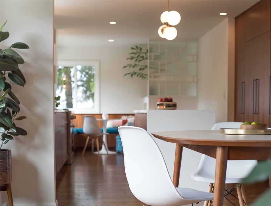 Detail of chairs at dining table in remodeled modern Portland kitchen