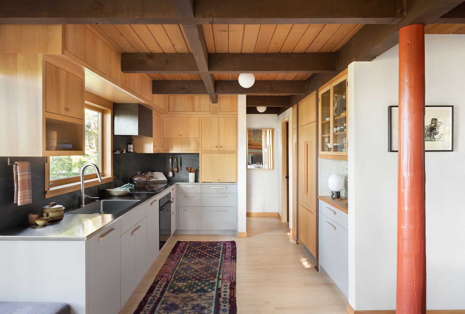 The kitchen remodel retains the original character while adding modern touches