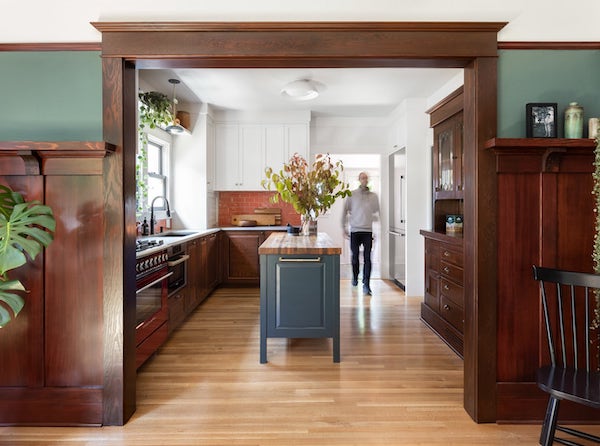 Grant Park Bungalow: Straight on shot of dark green custom kitchen island using Formology wood products