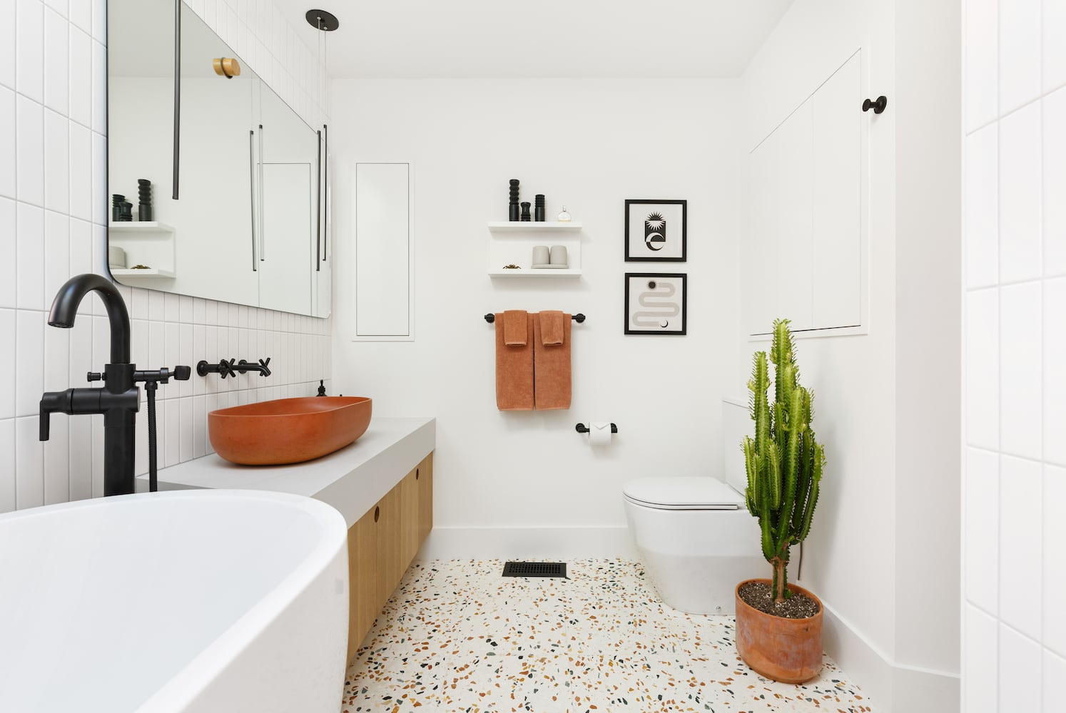 Portland residential bathroom remodel with terrazzo floors, angled floor plan