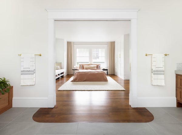 Portland interior design remodel arc bathroom tile into wood floor looking to bedroom