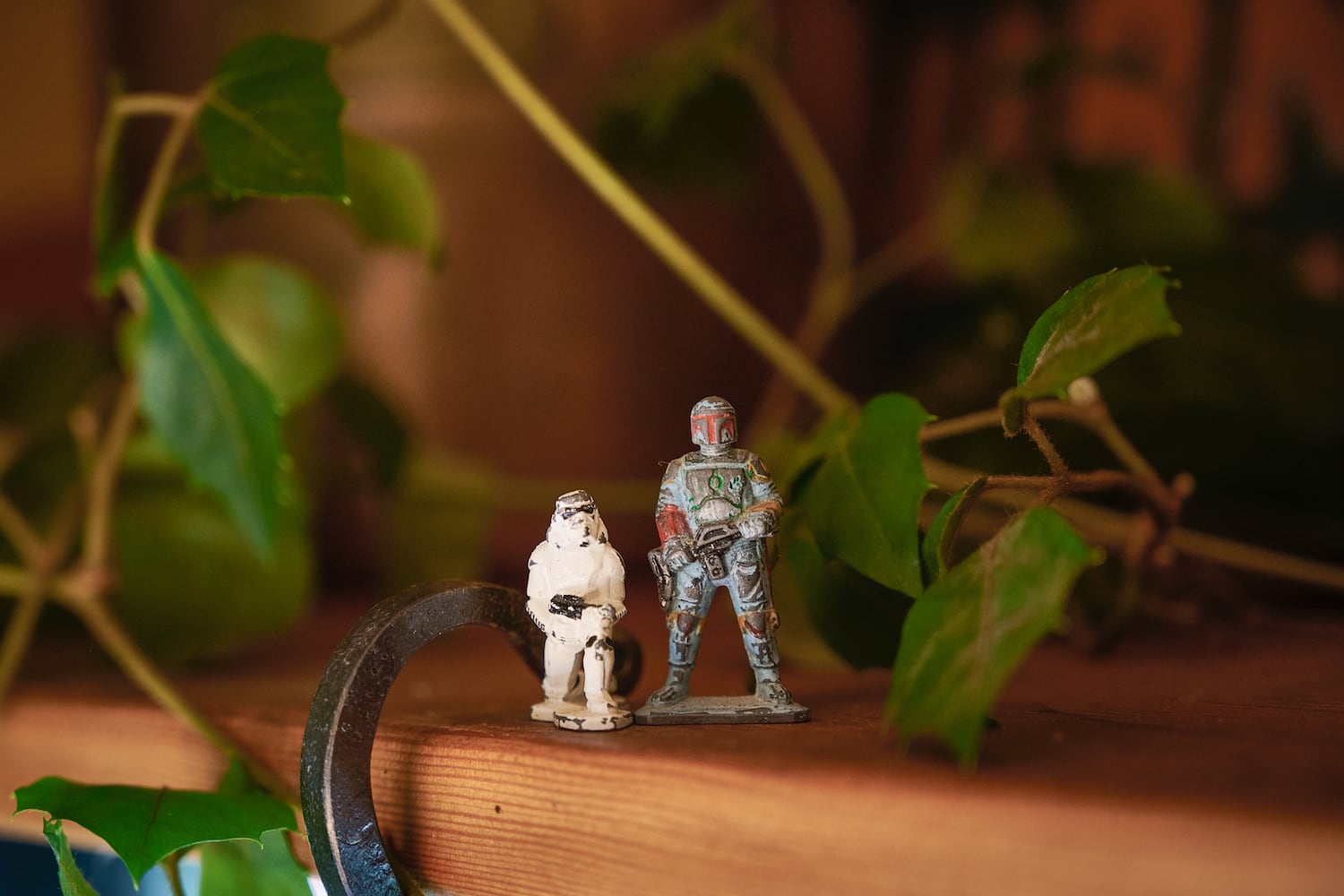 Miniature toys in playful detail of Northwest kitchen remodel's plant shelf